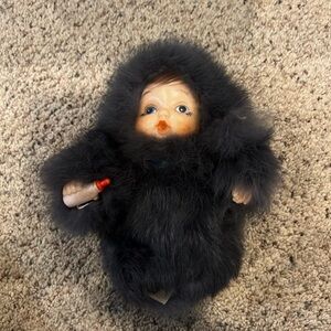 Vintage Doll with Black Fur Outfit
#5